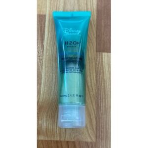Disney H2O+ Beauty Sea Marine Revitalizing Shampoo travel-size bottle.